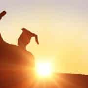 Silhouette,Of,Graduate,Against,Sun,Shining